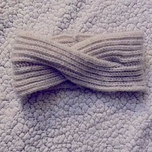 Cream colored head wrap.